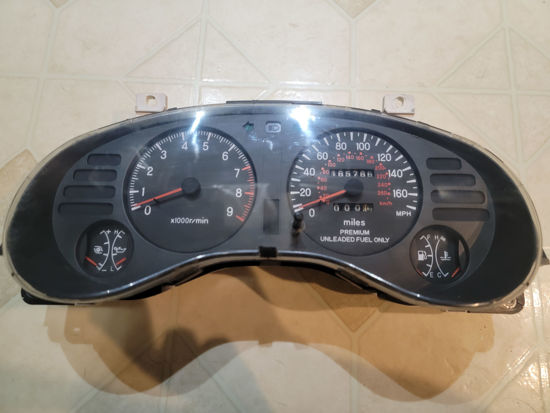 Picture of Gauge cluster 2g auto 165766 miles